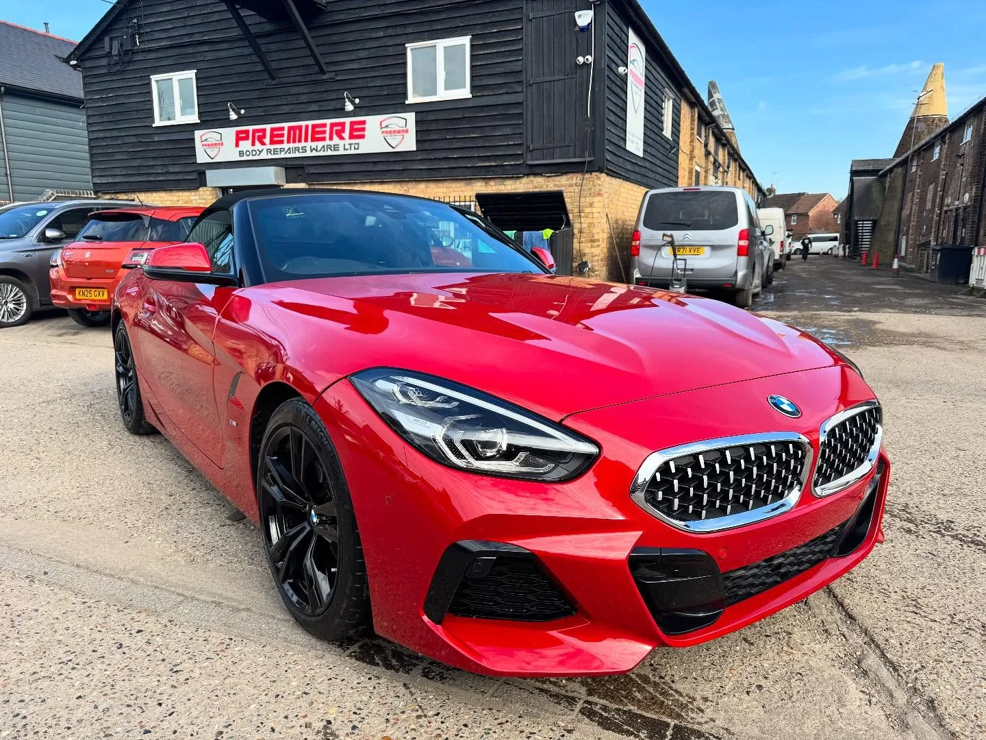 Red BMW Z4 finished outside the Premiere Body Repairs workshop in Ware